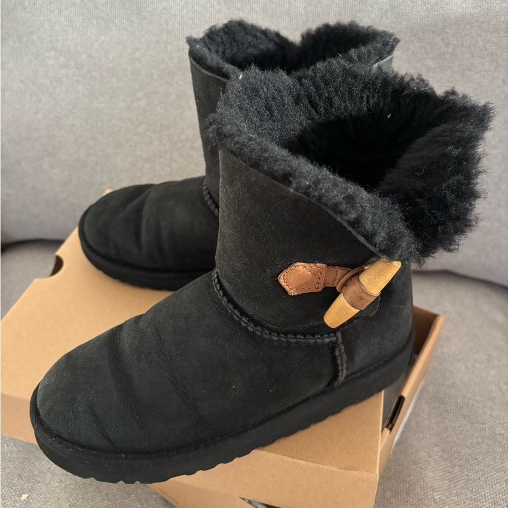 UGG Black fur Winter Boots with tan button clasp